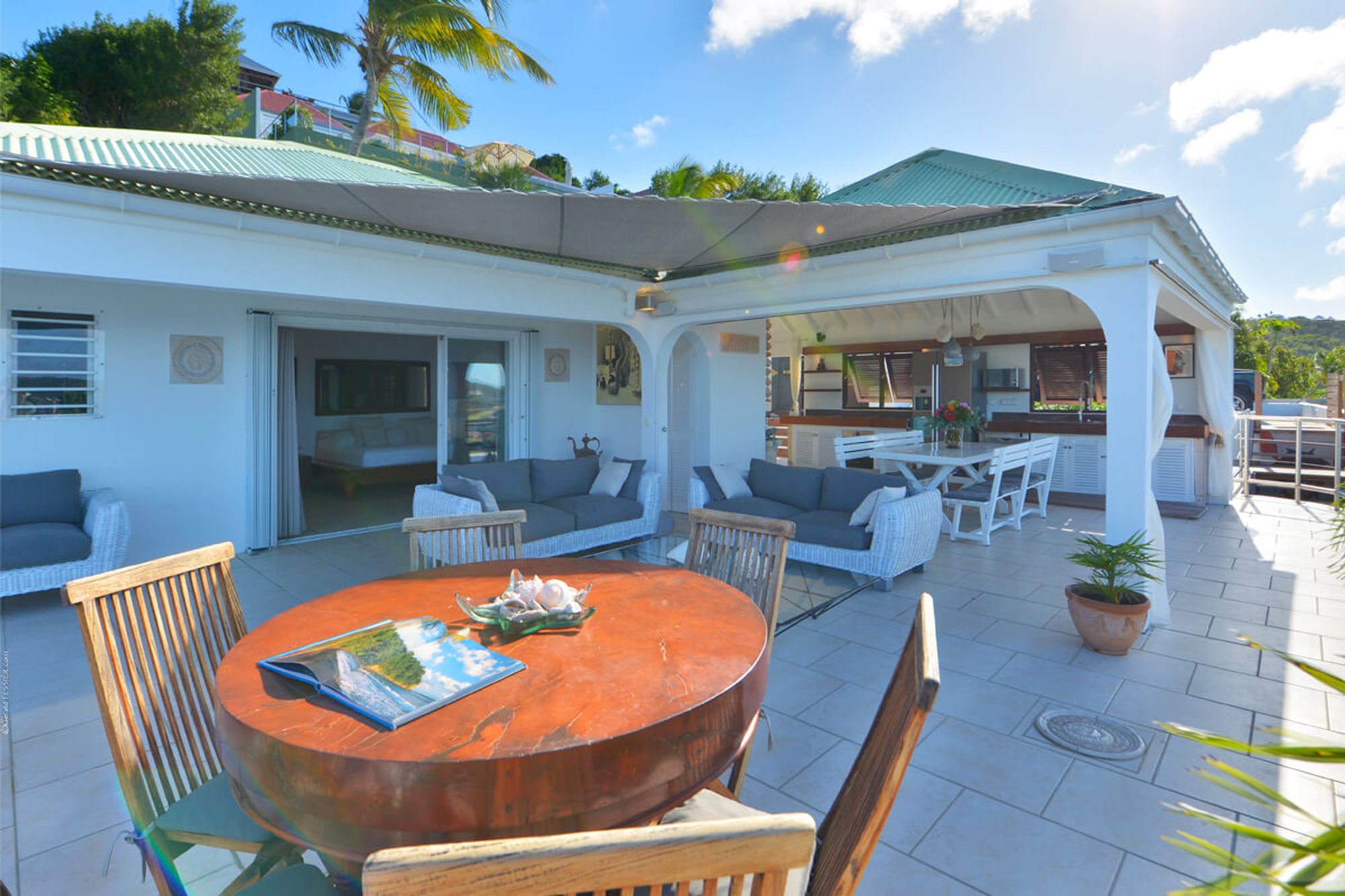 Patio pool deck with seating and dining options