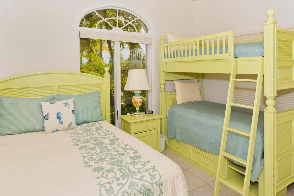 Bedoom three has a full bed and twin bunks