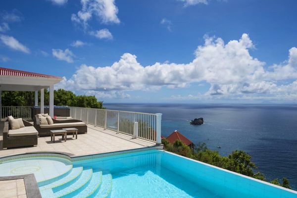 Manon Villa is located on a hillside in Colombier with great views