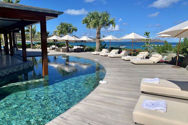 Luxurious Lorient Bay beachside pool deck at La Plage