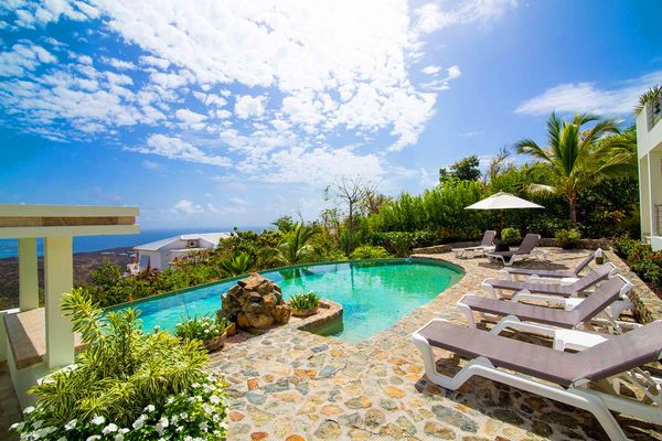 Victoria Villa is located in the Oyster Pond neighborhood on a hillside overlooking Orient Bay