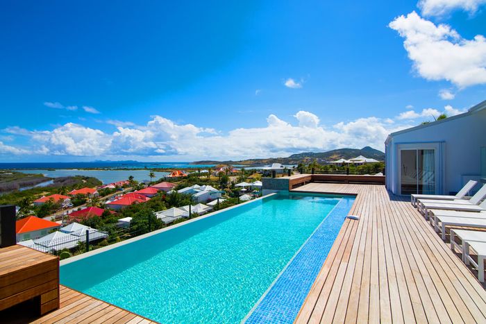 Villa Mango sits on the hillside above Orient Bay