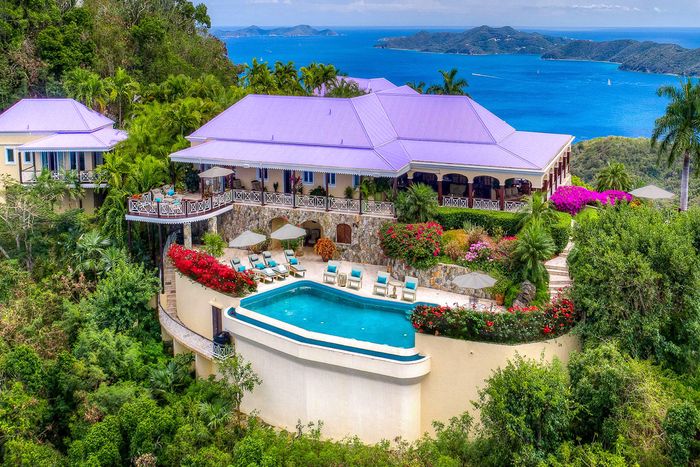 St. Bernard's Hill House Villa is located on a tropical hillside overlooking Belmont