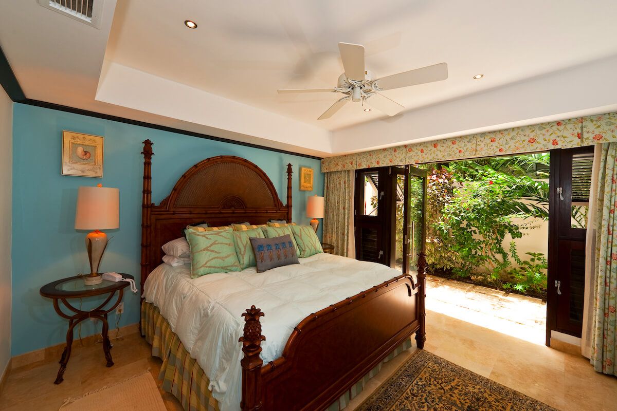 Master bedroom opens to a small patio