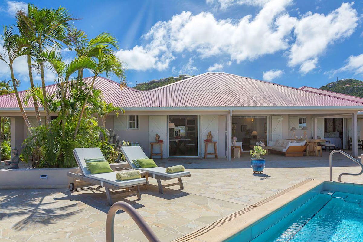 Pool side lounges at SAS Villa