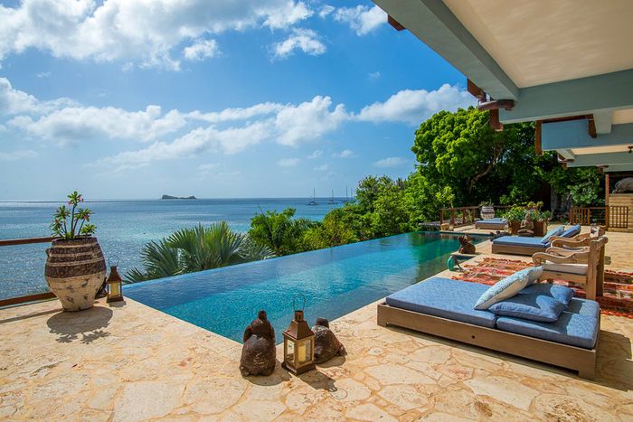 La Vida Villa is located on a hillside overlooking Nail Bay