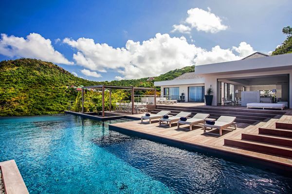 Eternity villa is tucked into at tropical hillside above Flamands