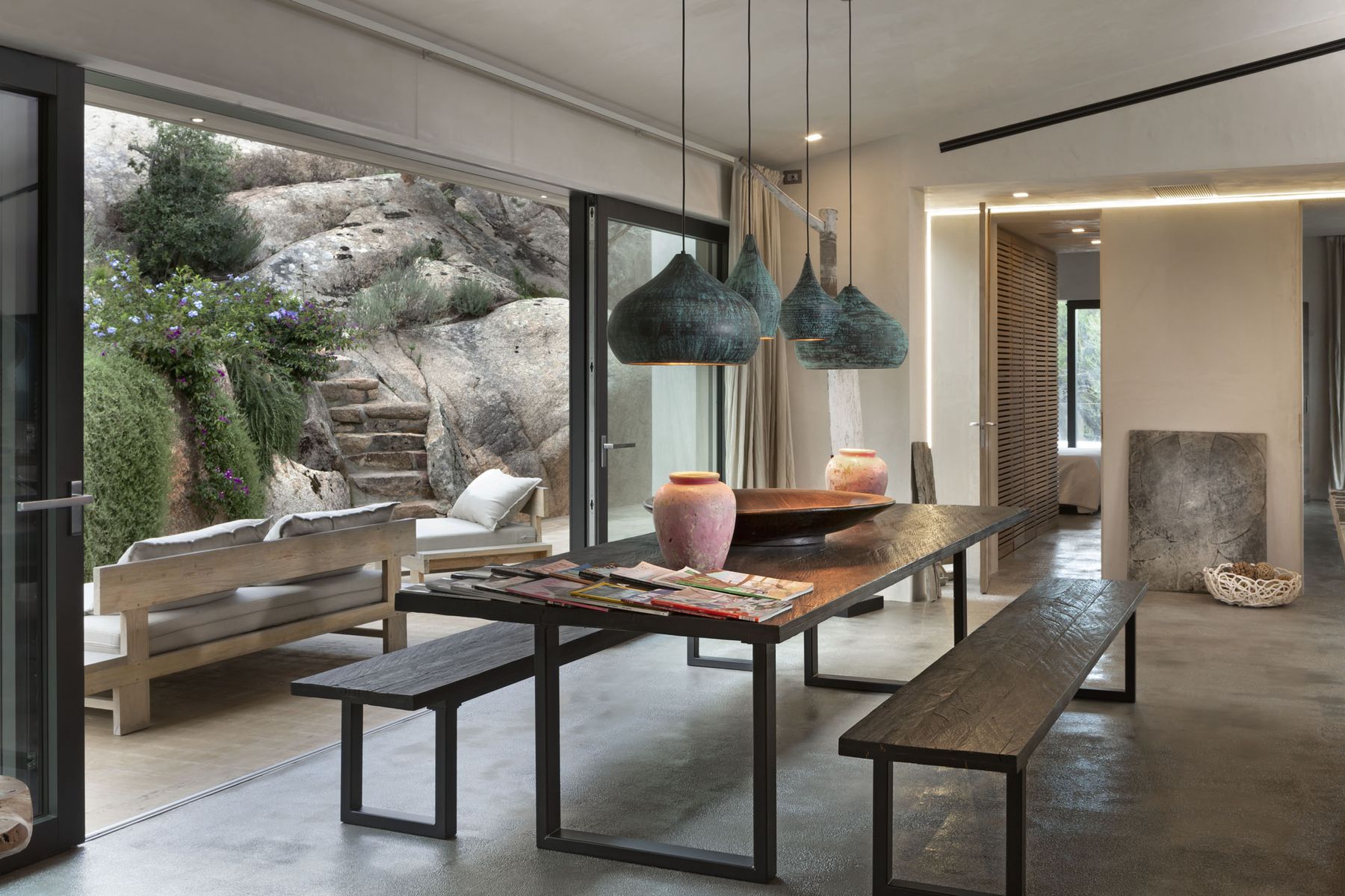 Modern interiors and plenty of space for everyone at the superb dining table, with seating for eight guests.