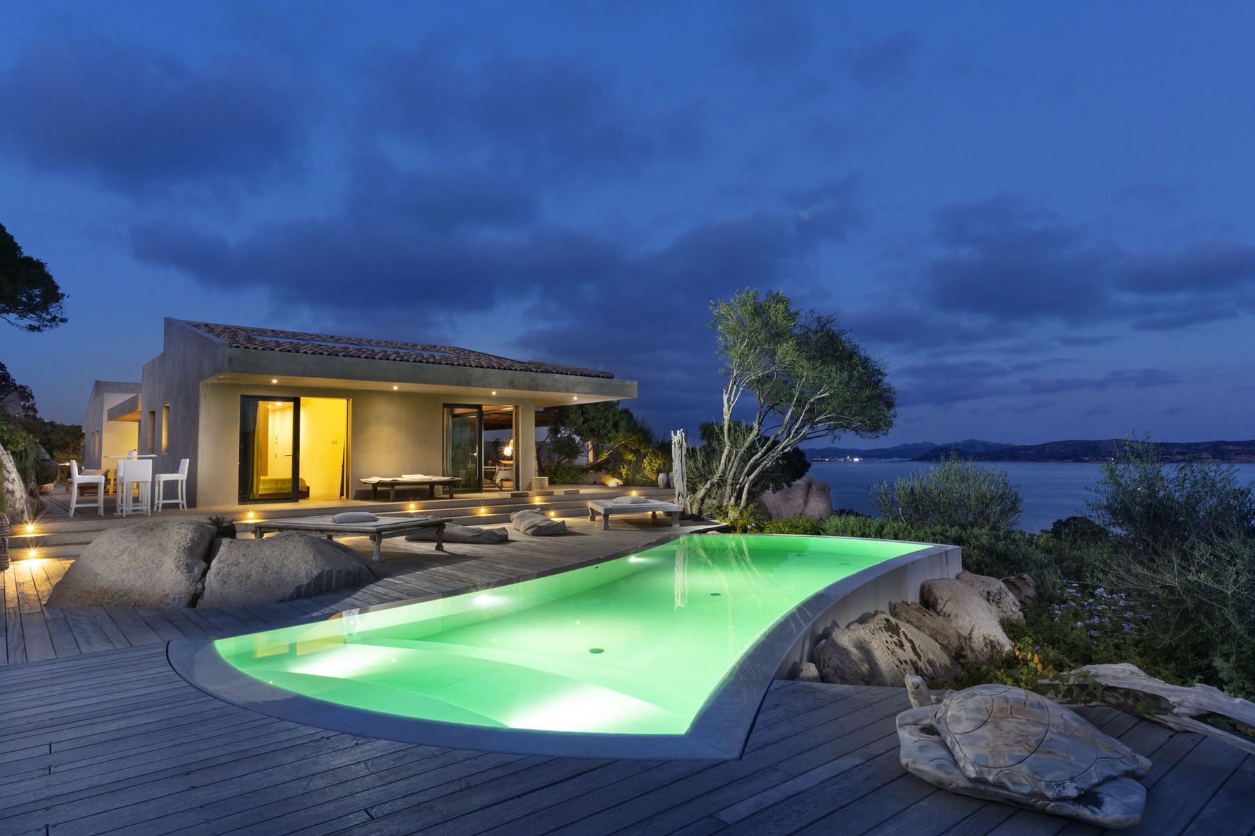 This stunning luxury villa has everything you need for a memorable family vacation in Sardinia, and is close to local amenities.