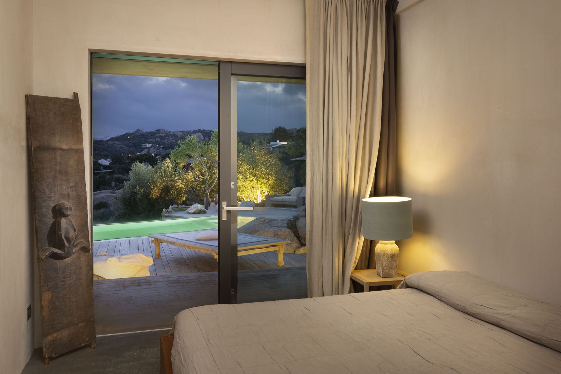 Double ensuite bedroom, bright and modern,  with access to the pool deck.