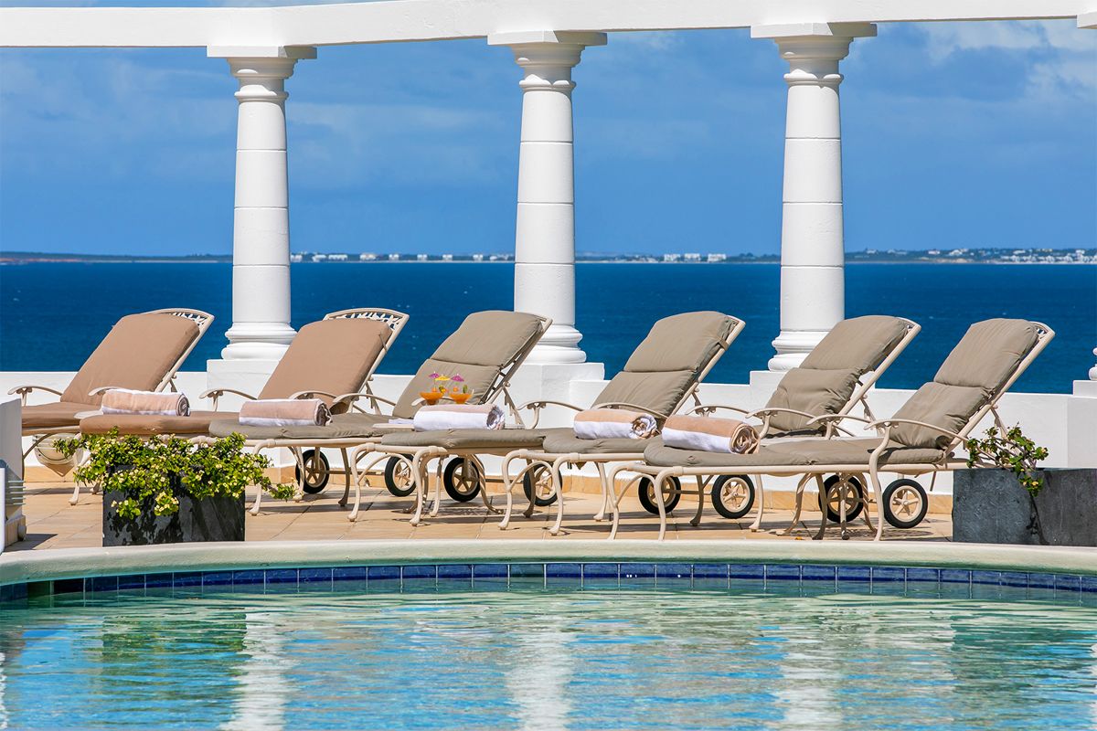 Pool area and sun loungers