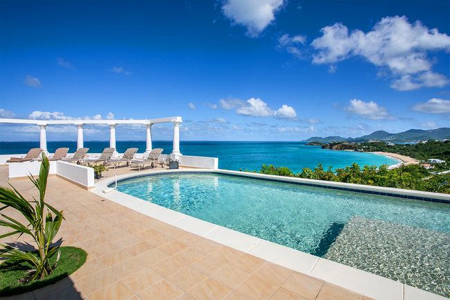 Terrasse de Mer Villa is located on a hillside with views of Baie Rouge Beach