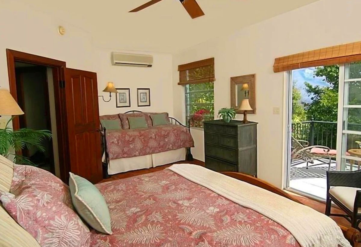 Third bedroom located by stairway - with a private deck