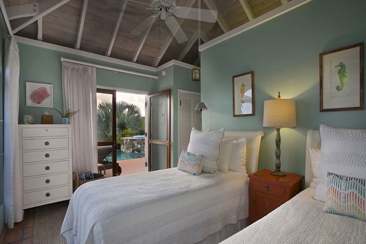 The Heavin suite has two twin beds on the pool level