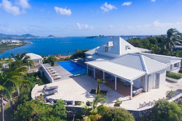Le Caprice Villa is located on a hilltop above Baie Rouge in Terres Basses