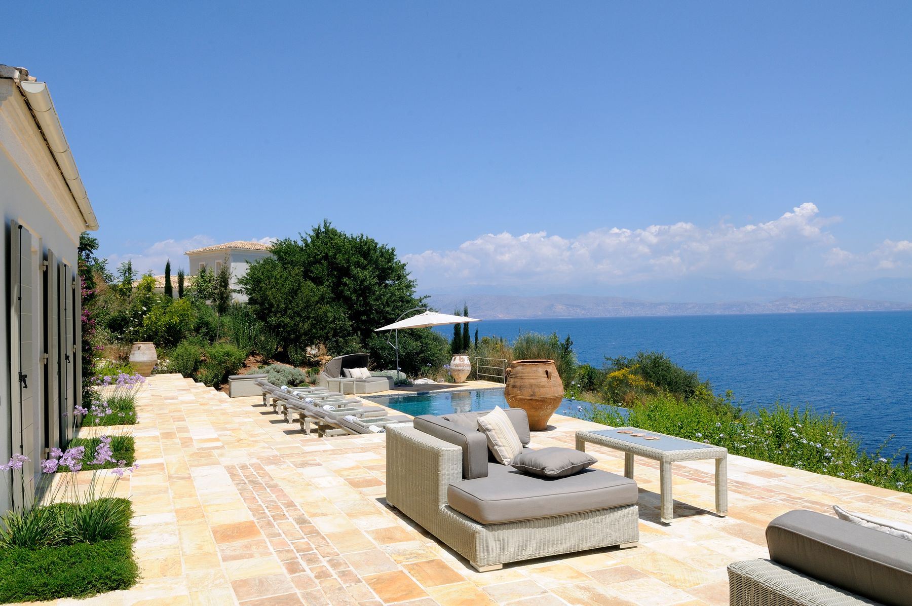 Stunning villa set in an idyllic setting by the sea and moments from Kassiopi town in Corfu.
