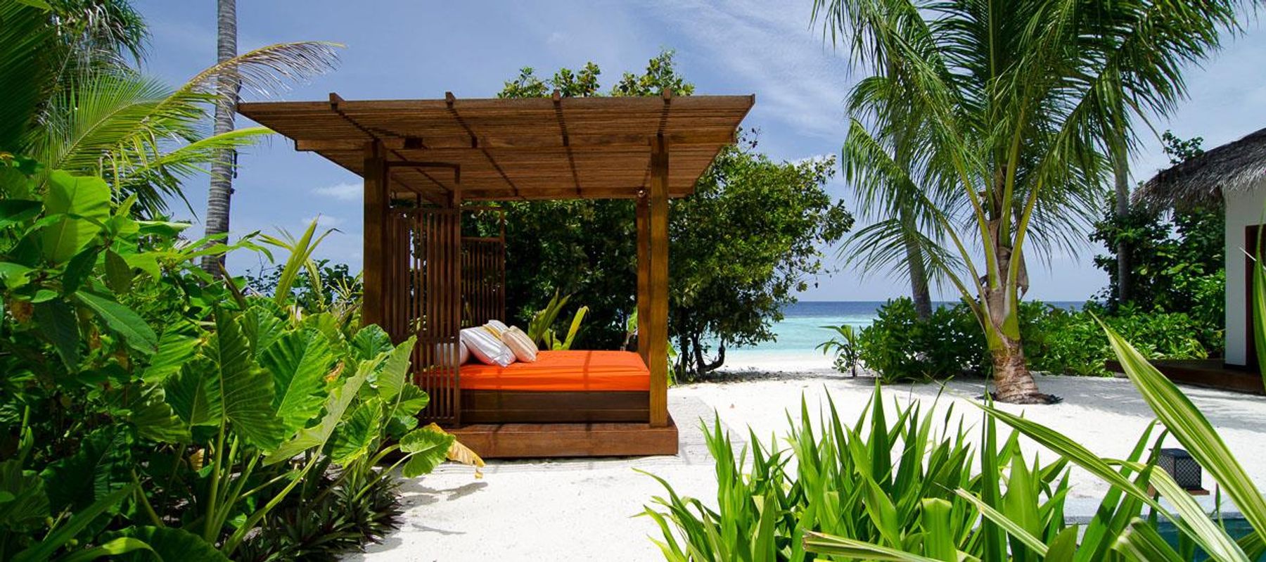 Jumeirah Dhevanafushi Beach Sanctuary Sunset villa photo.