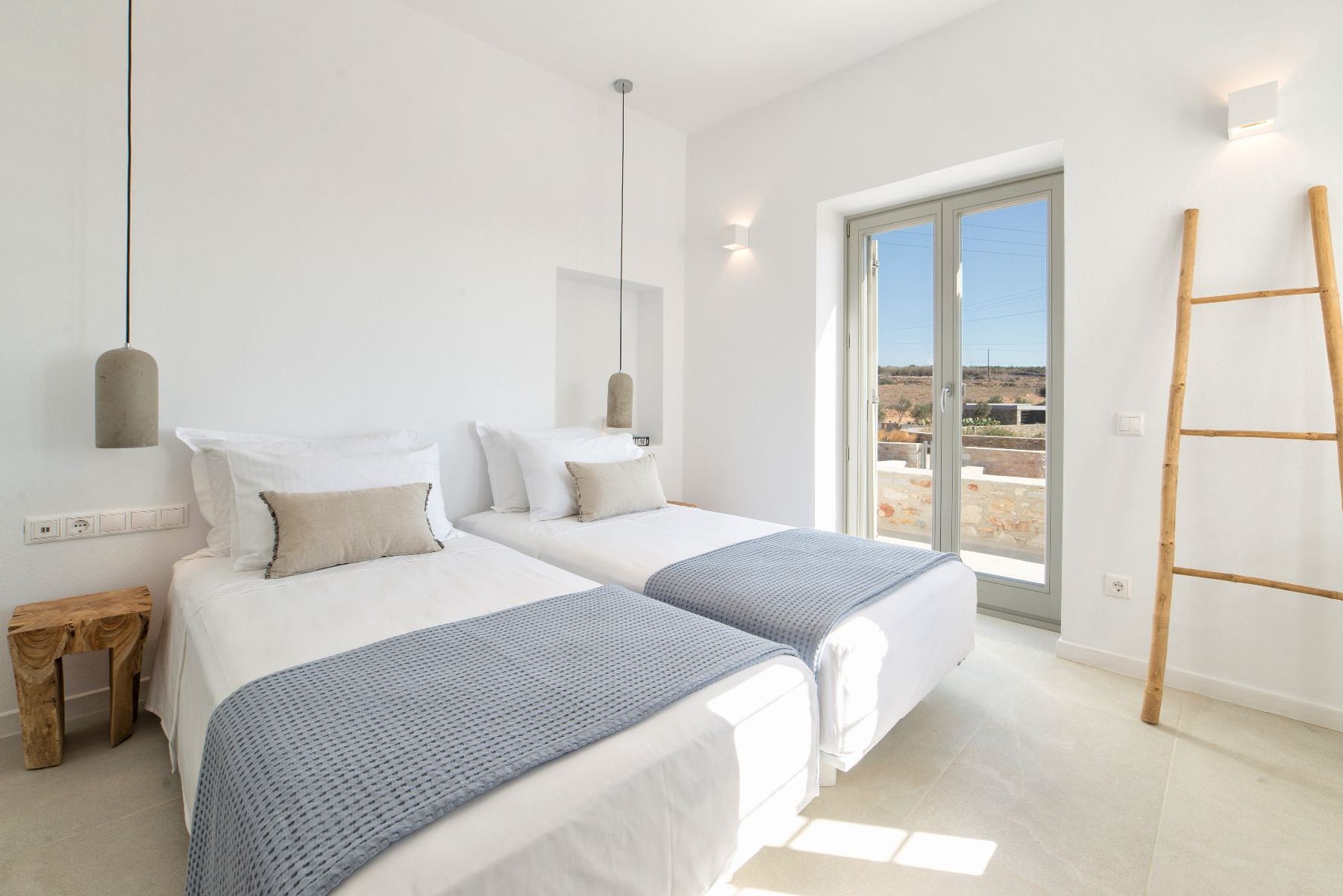 Twin bedroom, that can be converted into a double bed with anti-allergic bedding, a shared bathroom, and balcony.