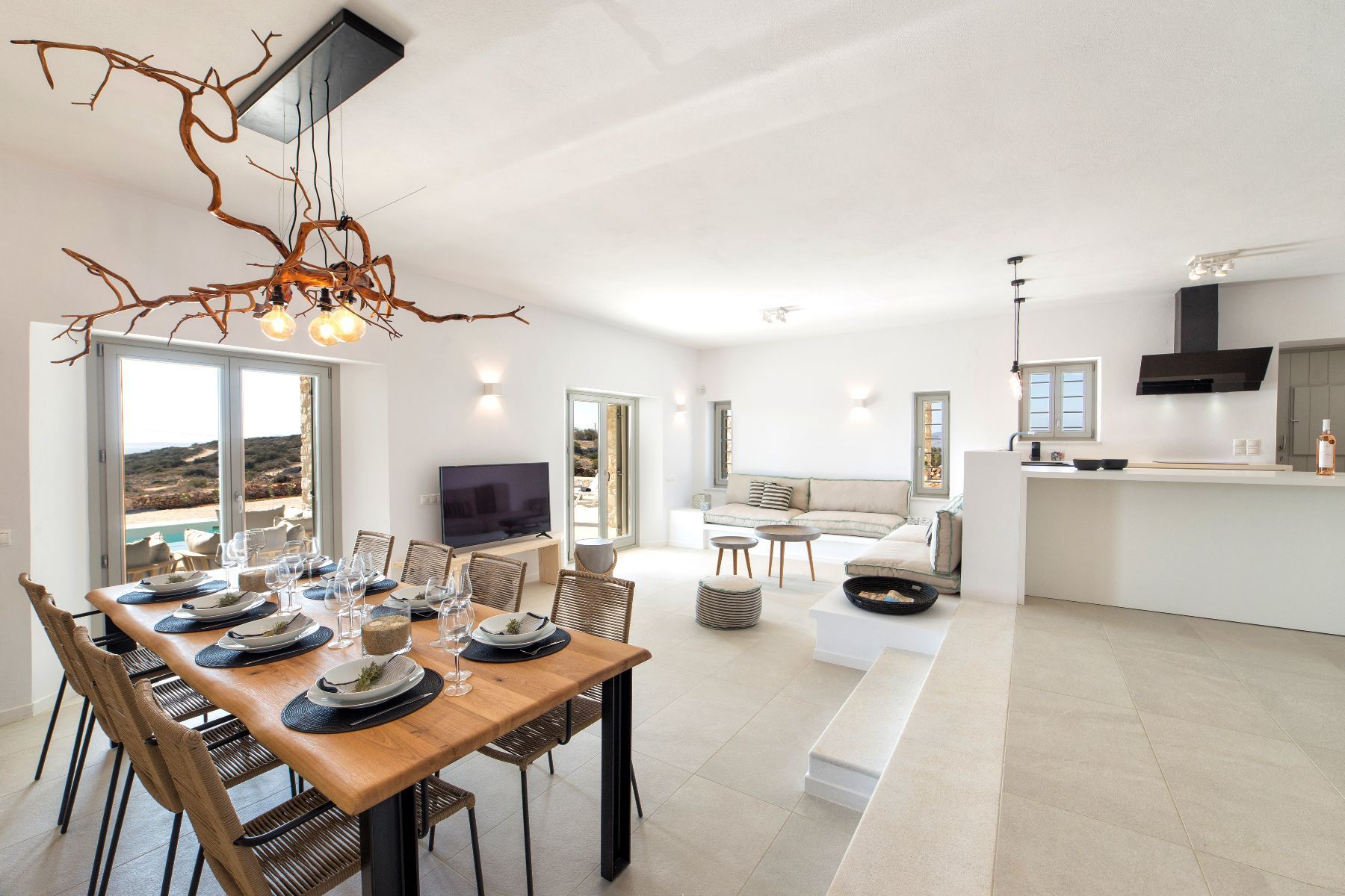 Bright and spacious open-plan kitchen with a separate dining area for up to ten guests.