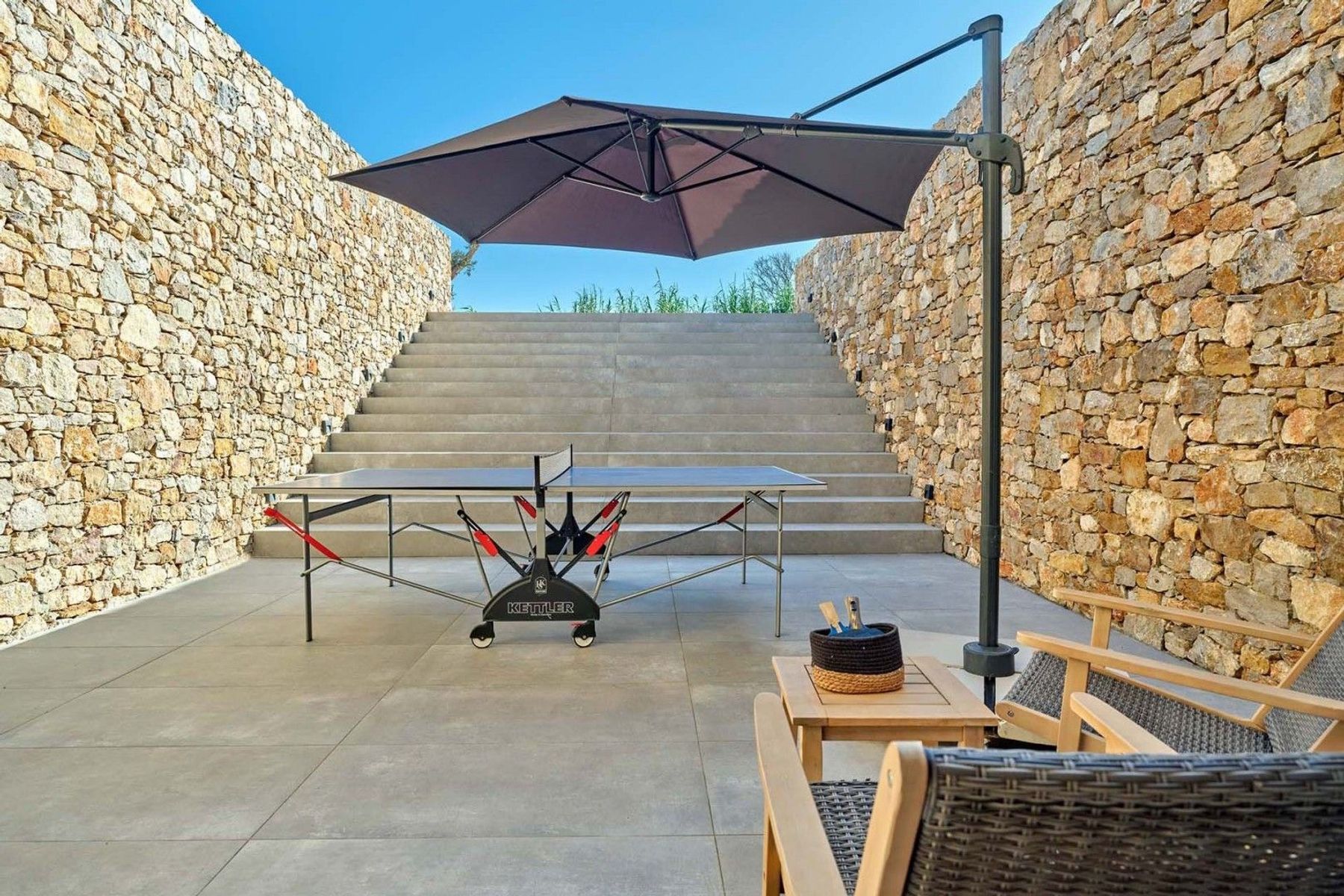 Take in a friendly game of table tennis on the shaded terrace.