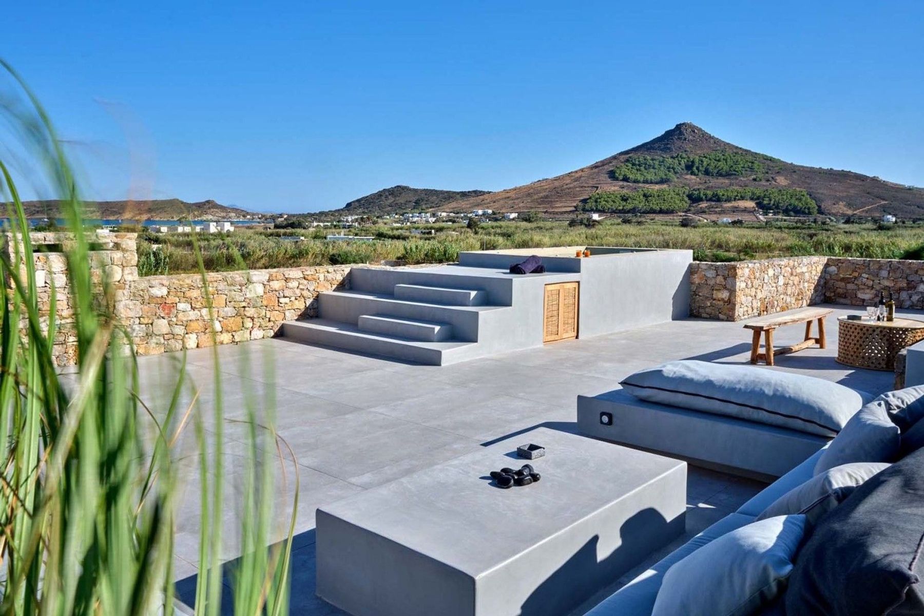The upper-level terrace also features plenty of space to practice yoga or meditation, or simply relax in the comfortable lounge area.