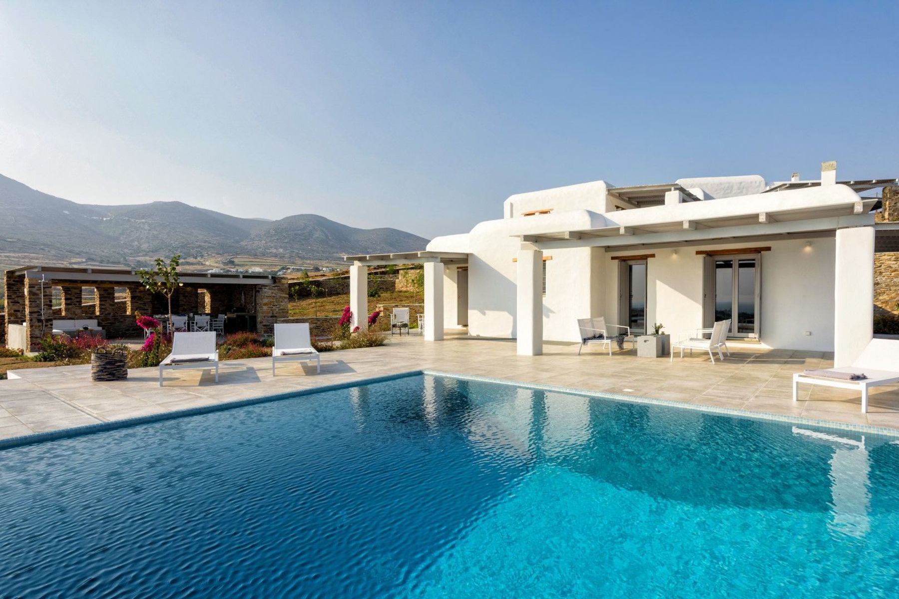 Superb private swimming pool with spacious poolside terraces.