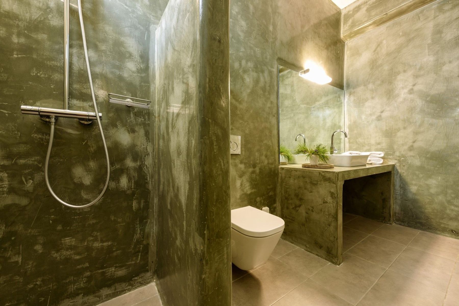 Bathroom with walk-in shower.