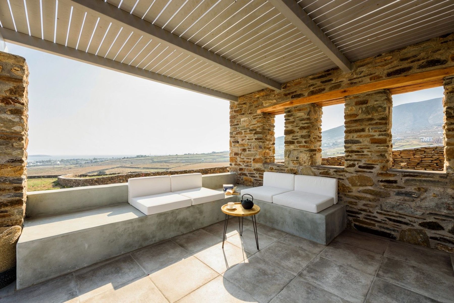 Take some time in the outdoor lounge, shaded by a pergola and with mesmerising vistas.