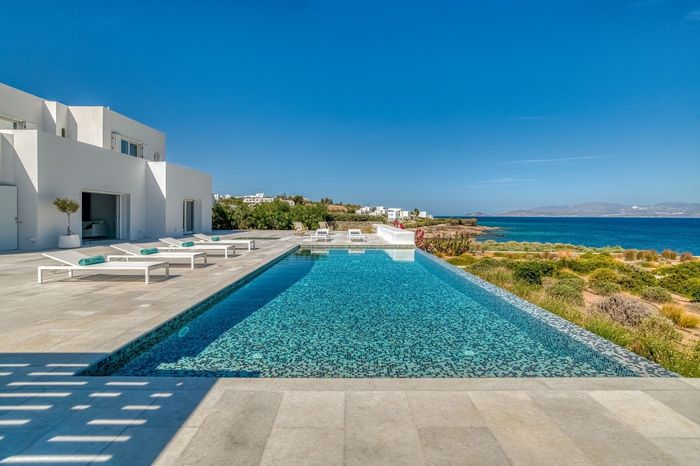 Spacious and modern luxury property with private infinity pool and sweeping sea views.