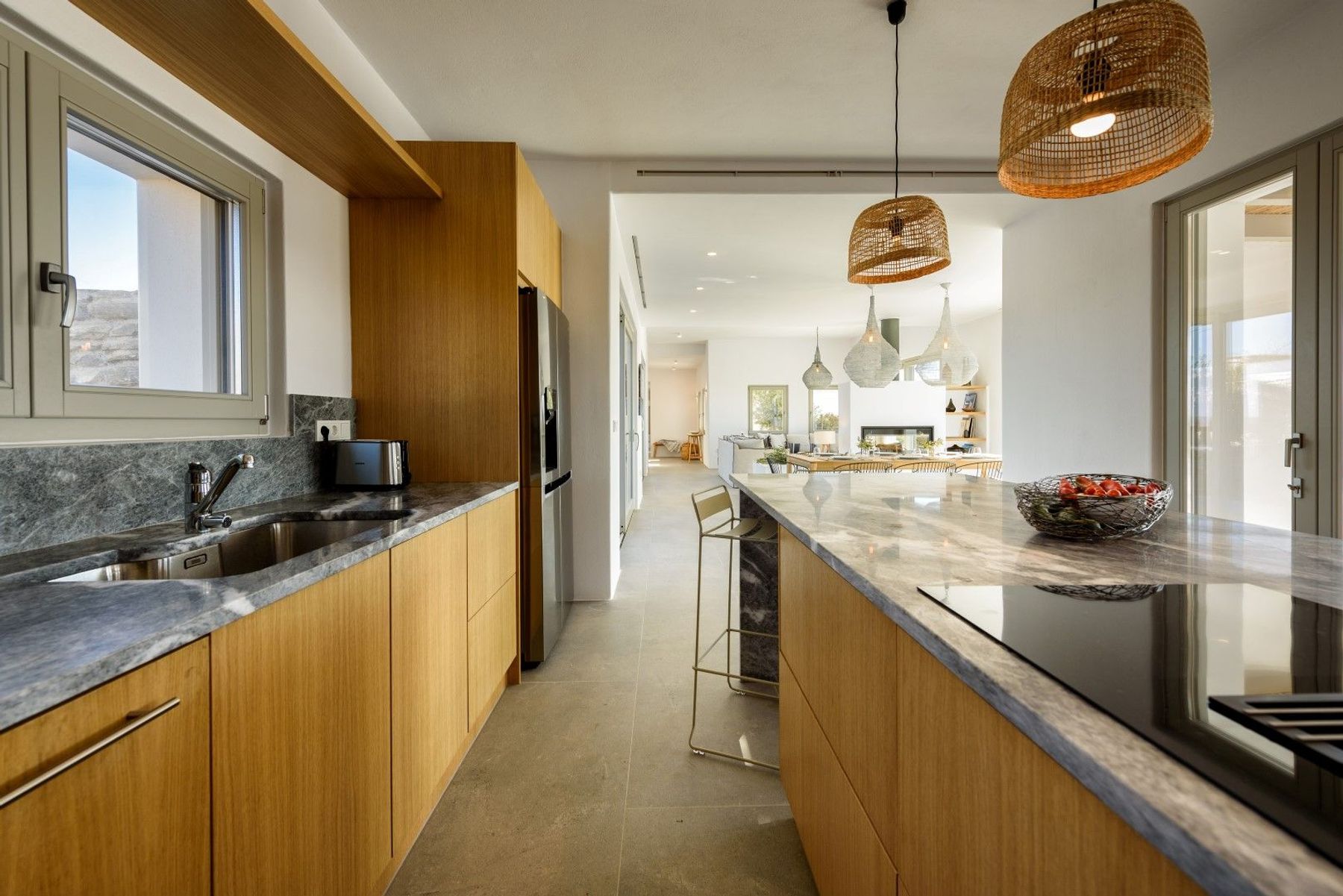 Modern open-plan kitchen with large central island.