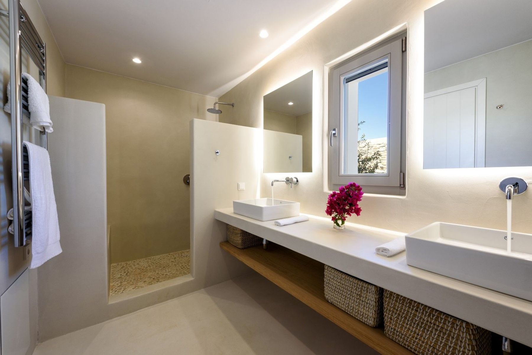 Ensuite bathroom with walk-in shower and double basins.