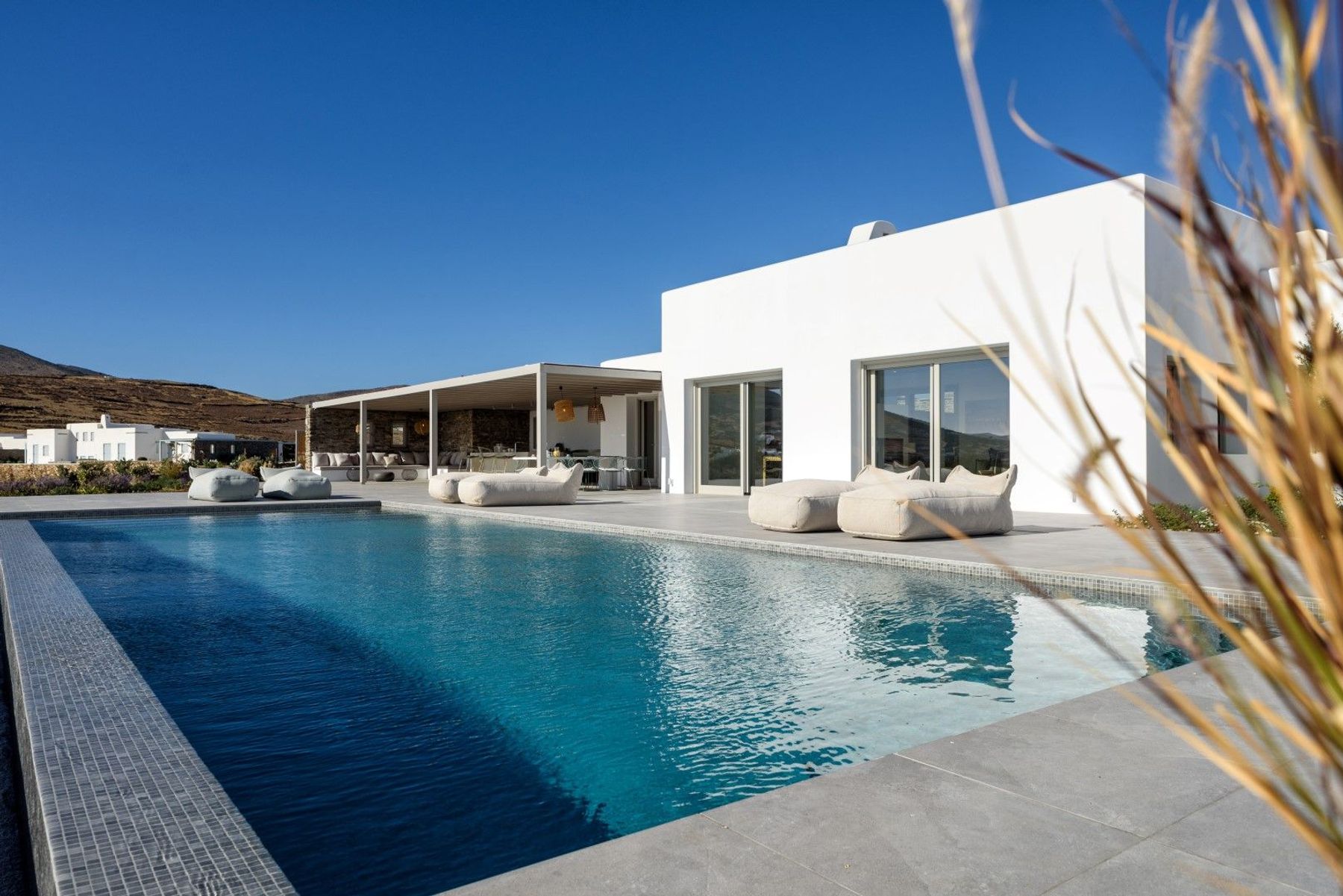Expansive terrace space with outdoor lounge and dining space, perfect for entertaining.