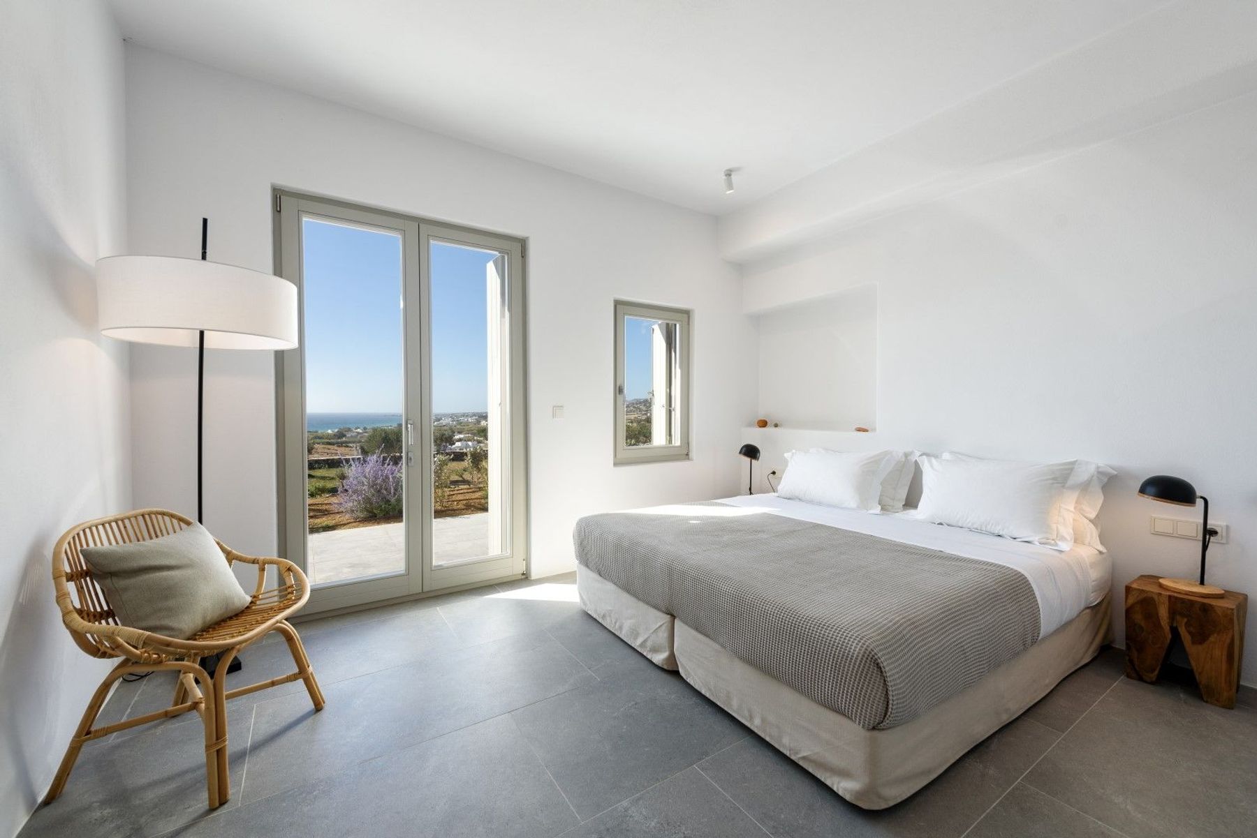 Double ensuite bedroom with direct access to the stunning terrace, and sea views.