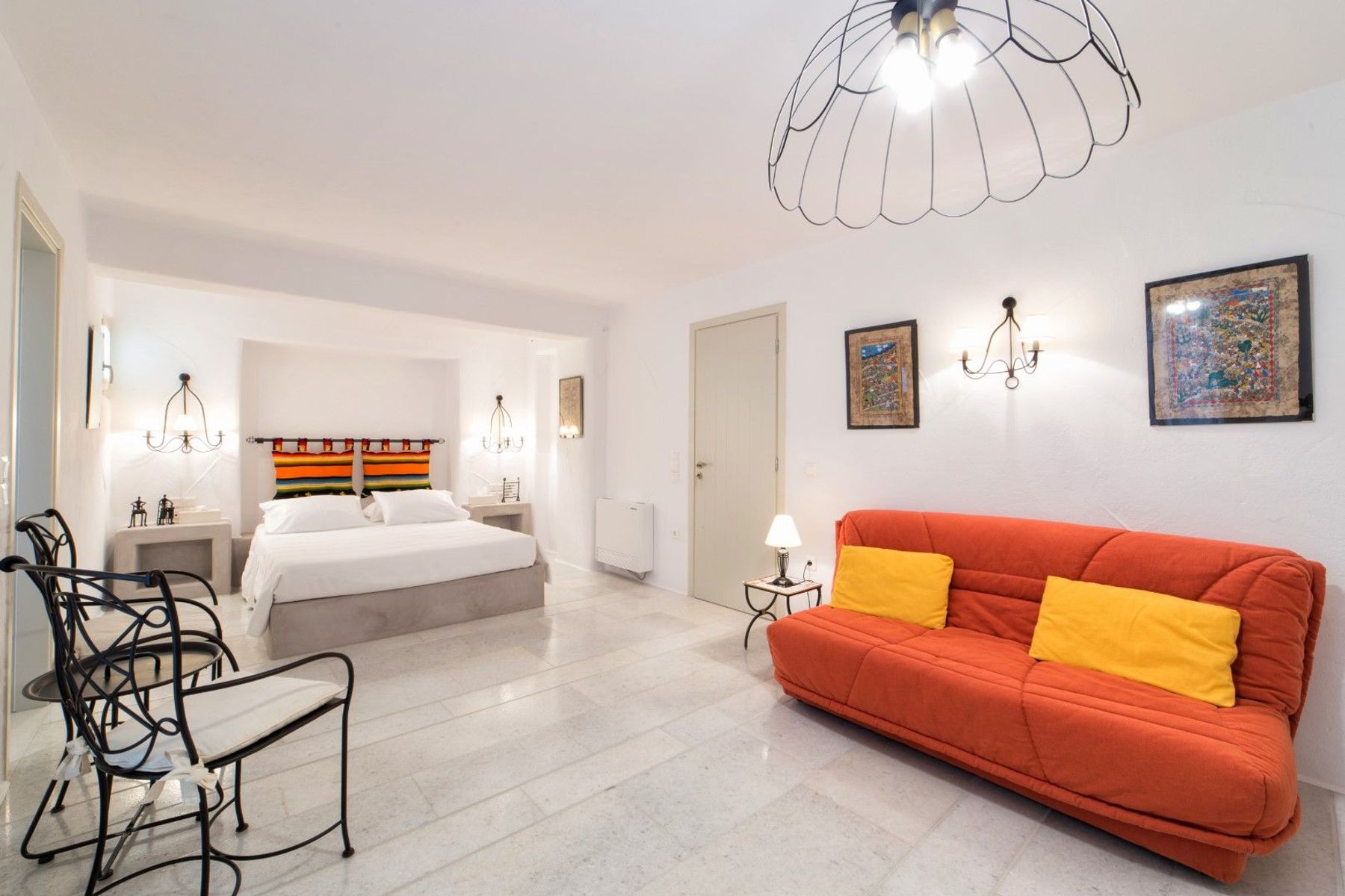 Double ensuite bedroom with comfy sofa, and direct access to the pool area.