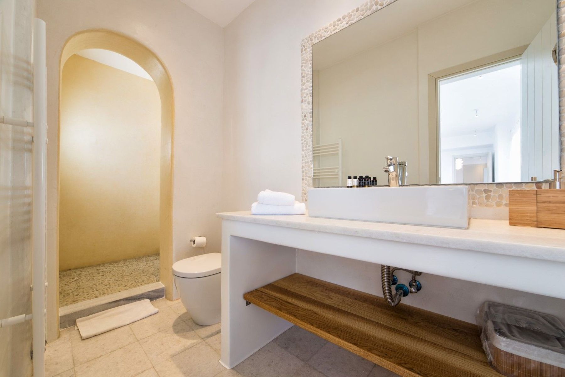 Bathroom with walk-in shower.