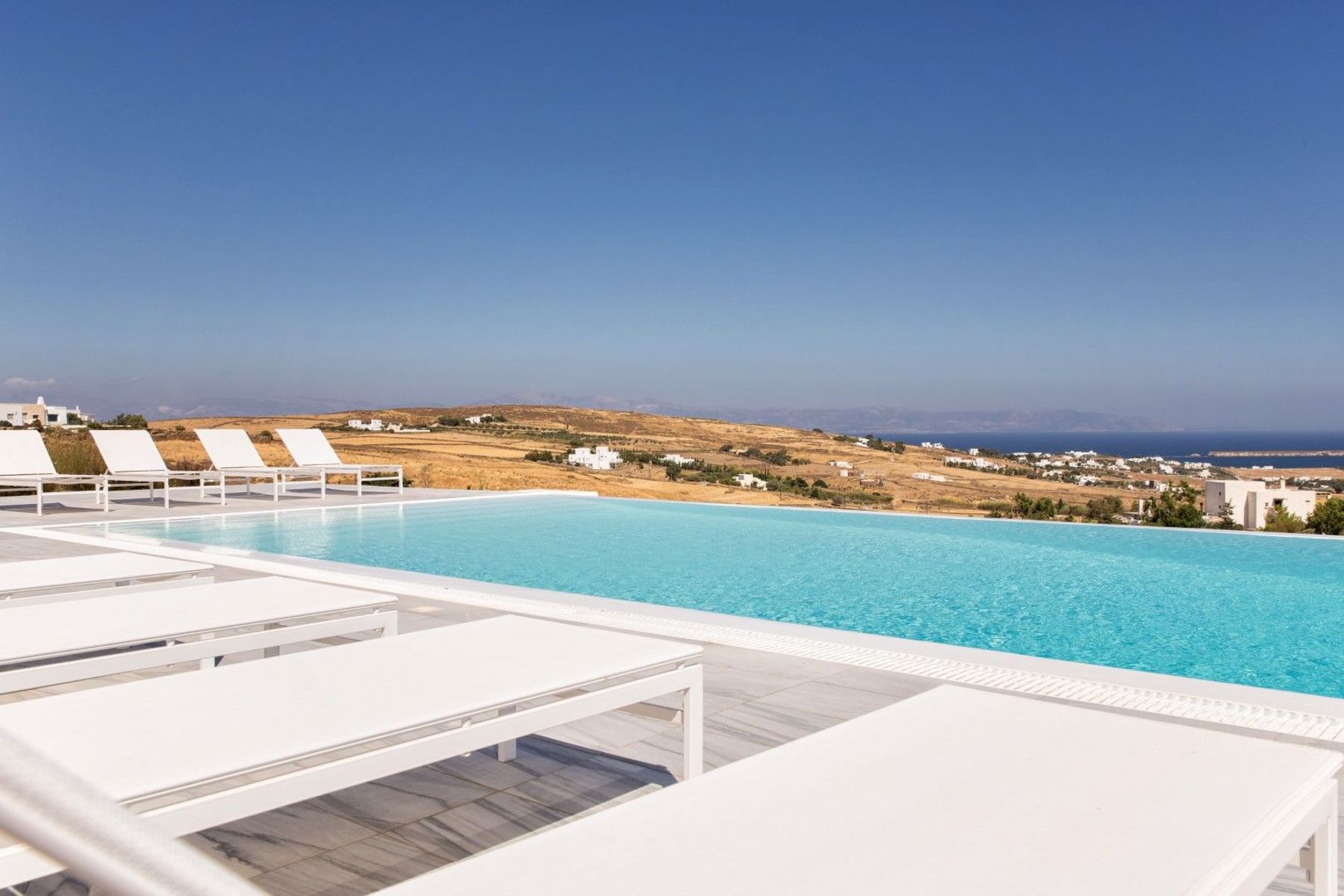 Find your favourite spot on one of the sun loungers on the terrace and savor those seaside views.