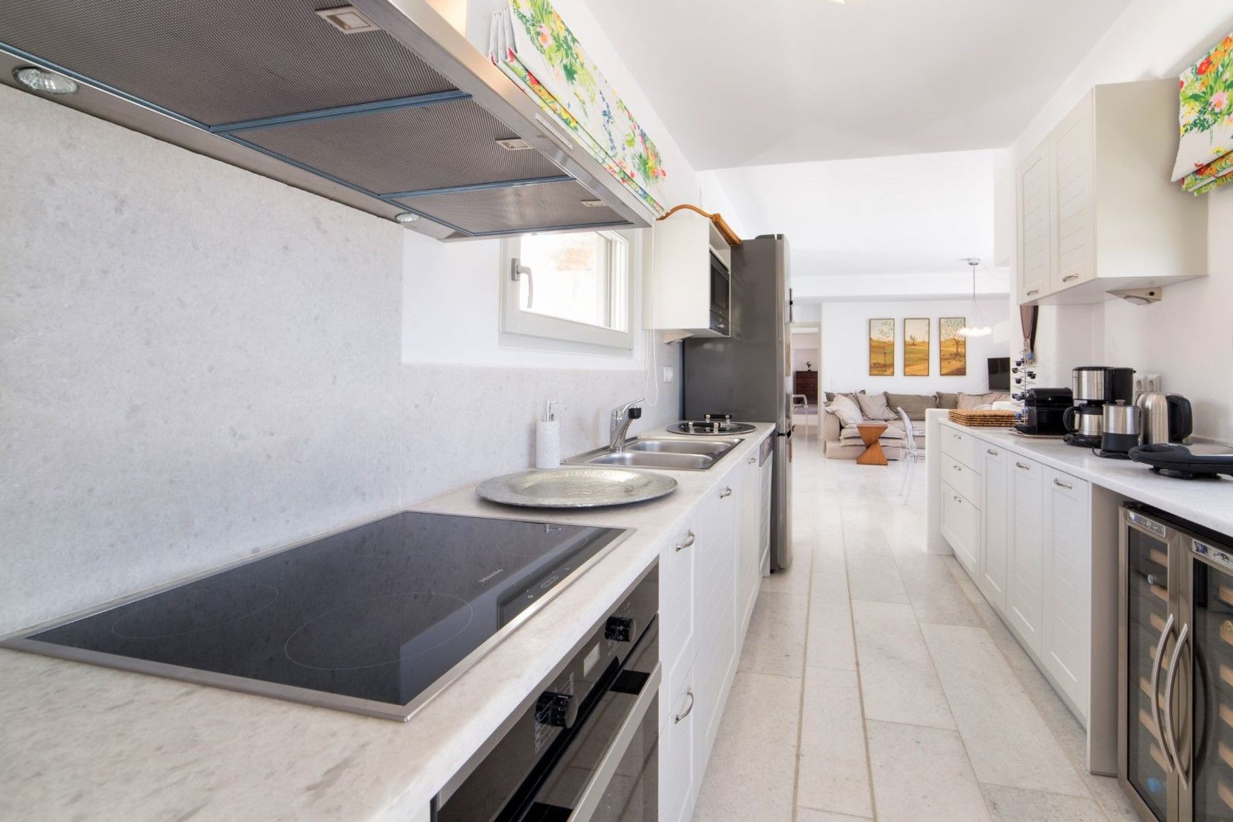 Fully-equipped modern kitchen with wine-cooler. 