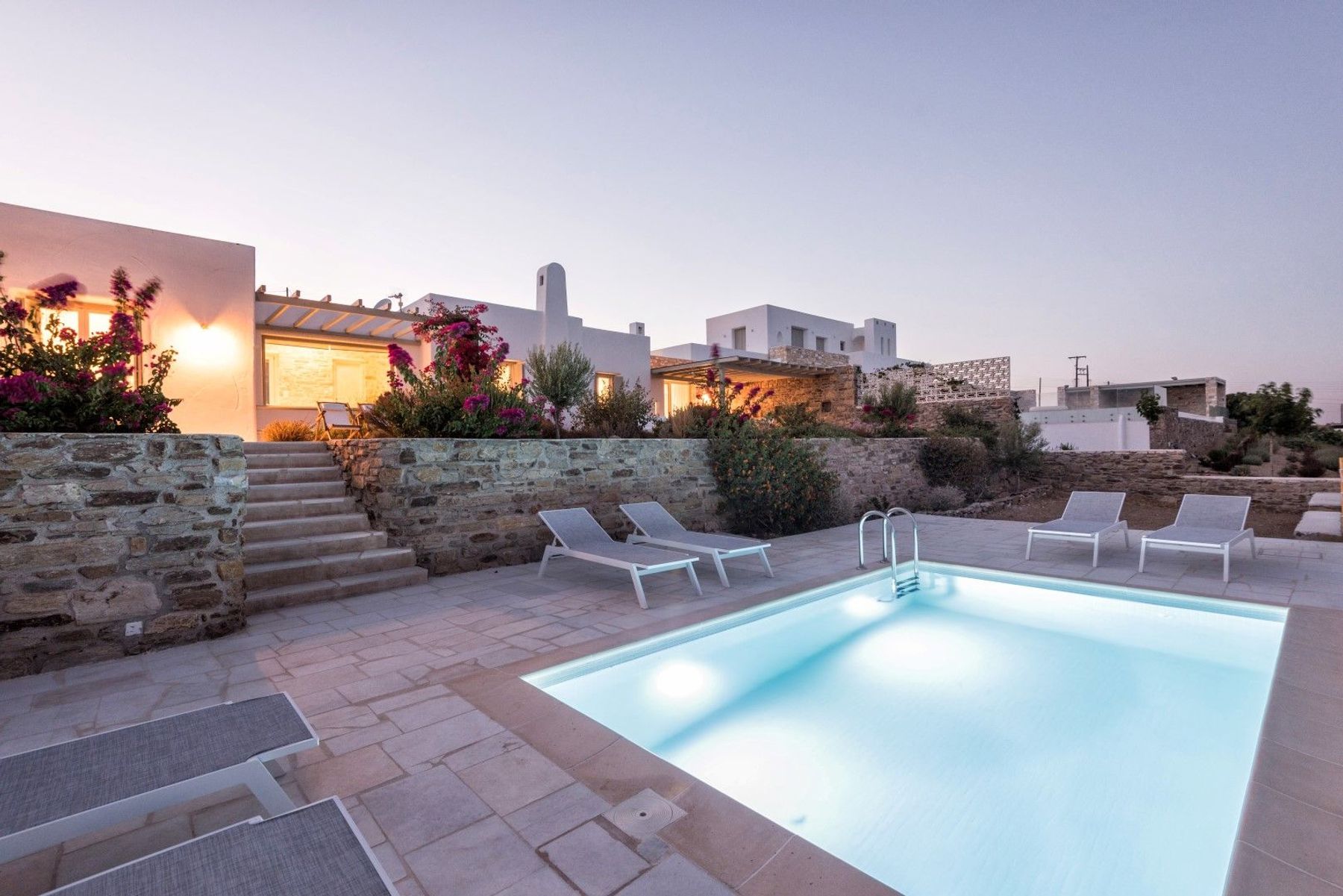 Stunning two-storey villa, surrounded by verdant walled gardens.