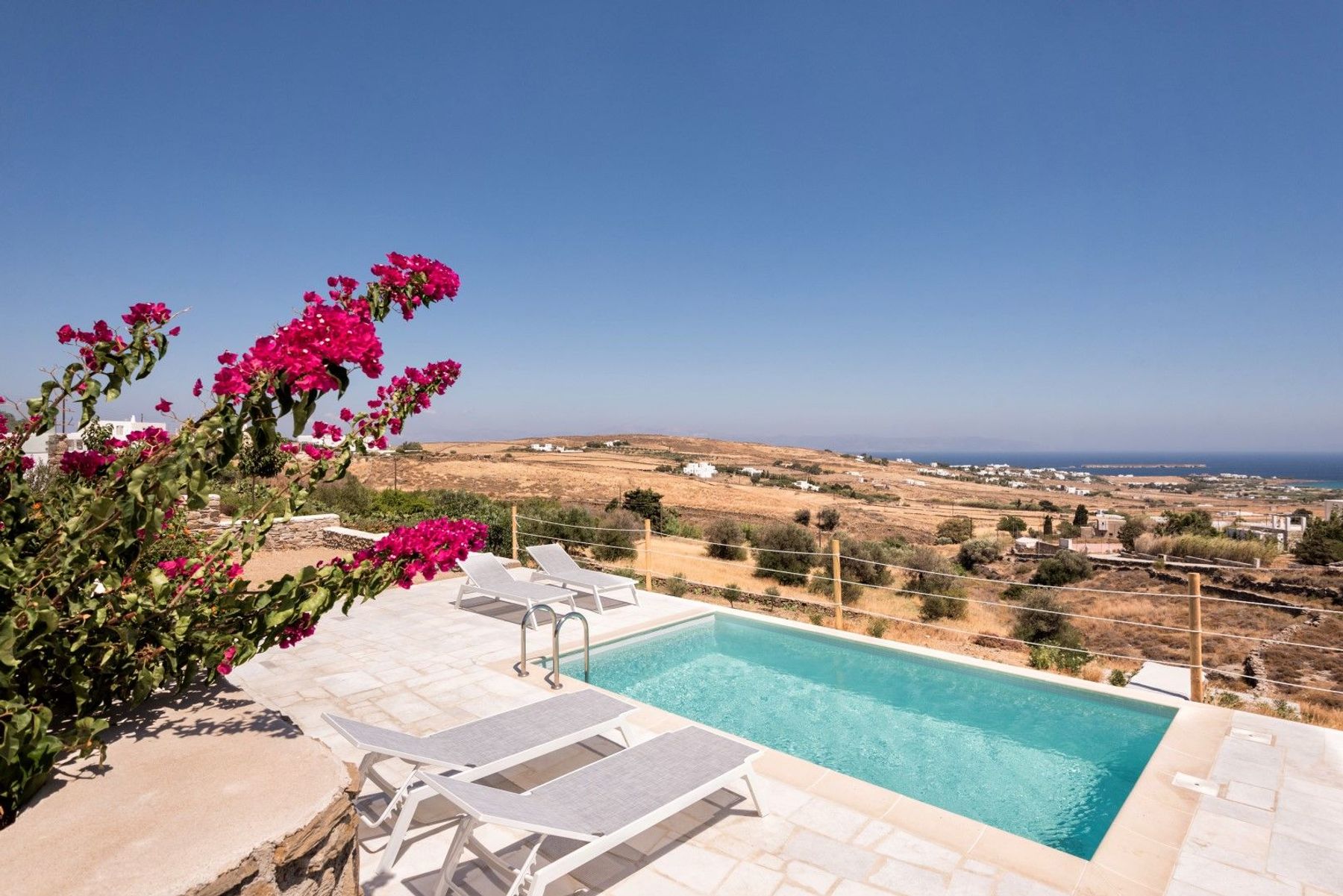This stunning villa has a private plunge pool that offers panoramic views of the sea.