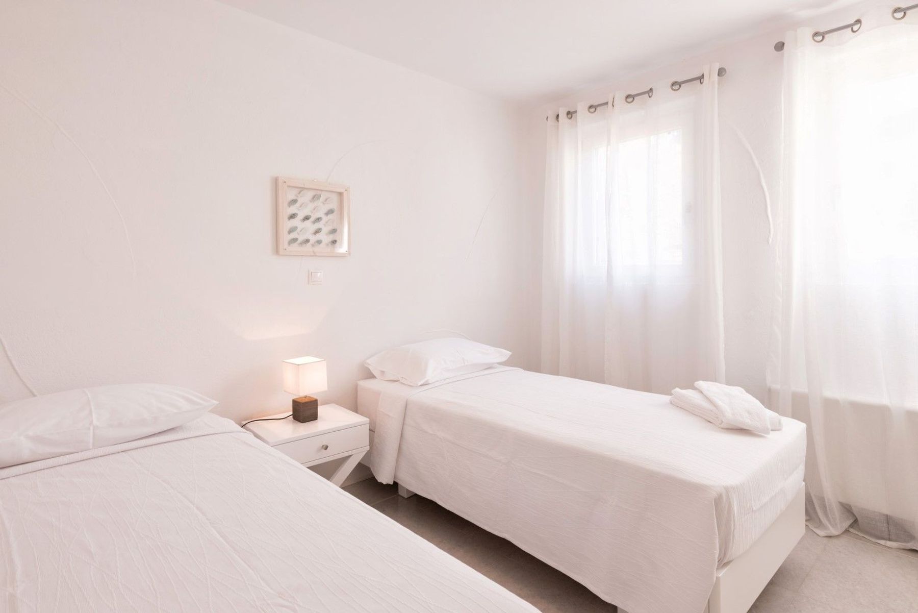 Bright and airy twin bedroom. Beds can be connected to make a double bed.