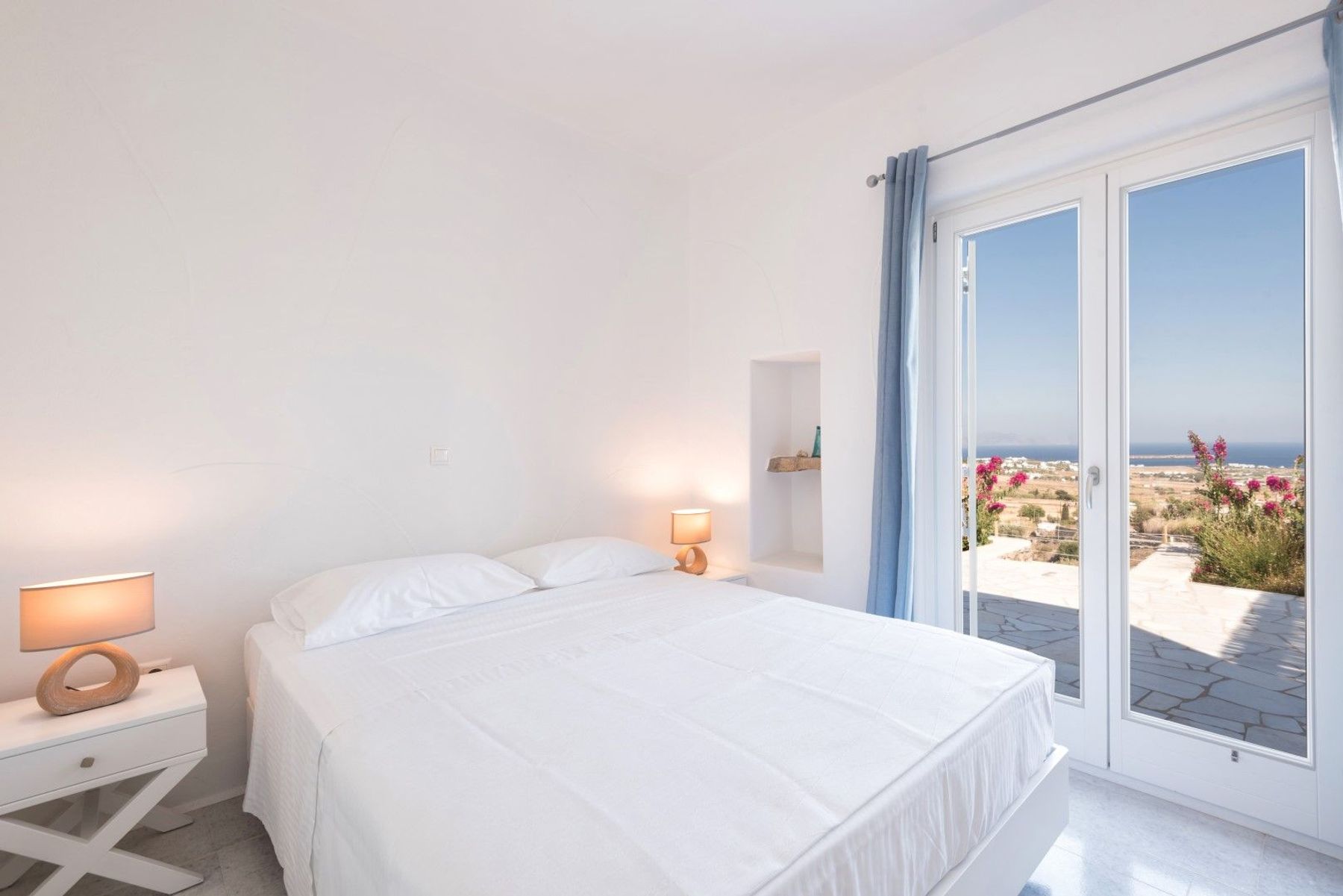 Double bedroom with private access to the terrace, and stunning sea views.