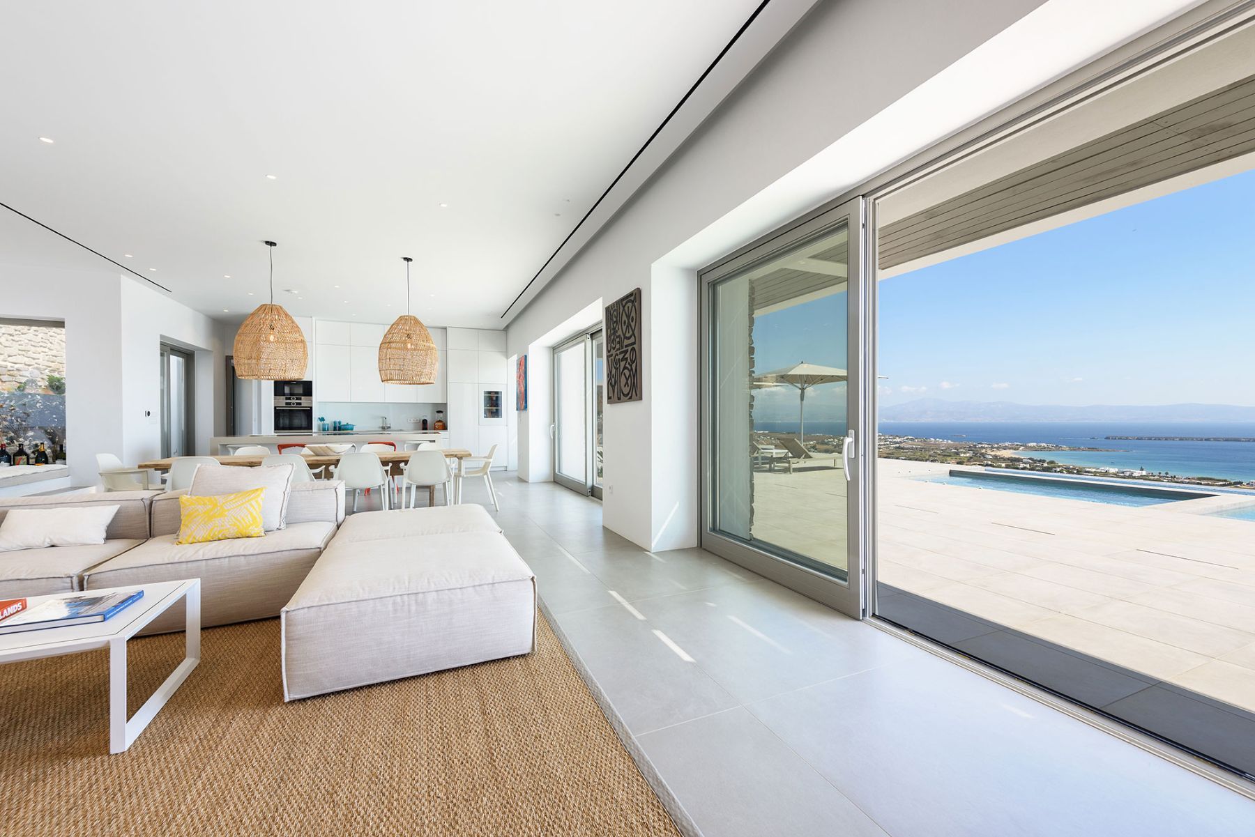 Floor-to-ceiling windows allow for bright and airy open-plan living. 