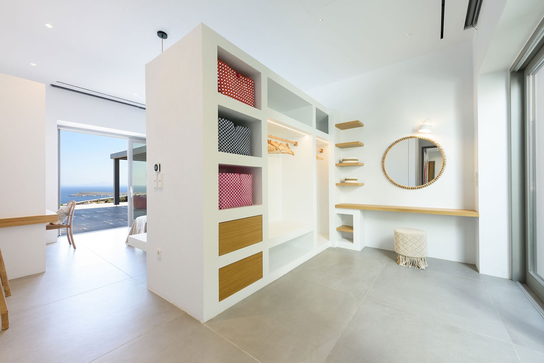 Spacious double ensuite bedroom, with extensive storage and dressing area.
