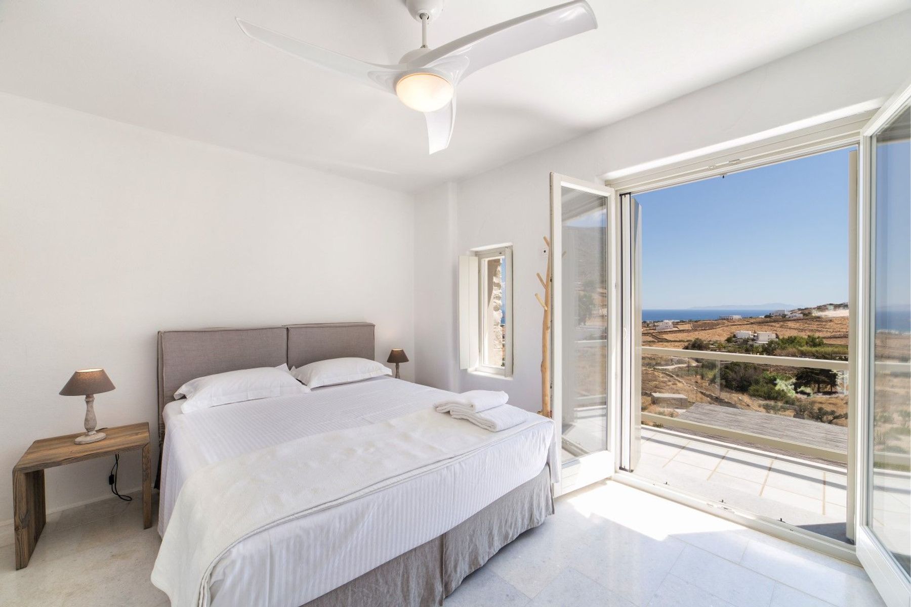 Double ensuite bedroom with private terrace and sea view.