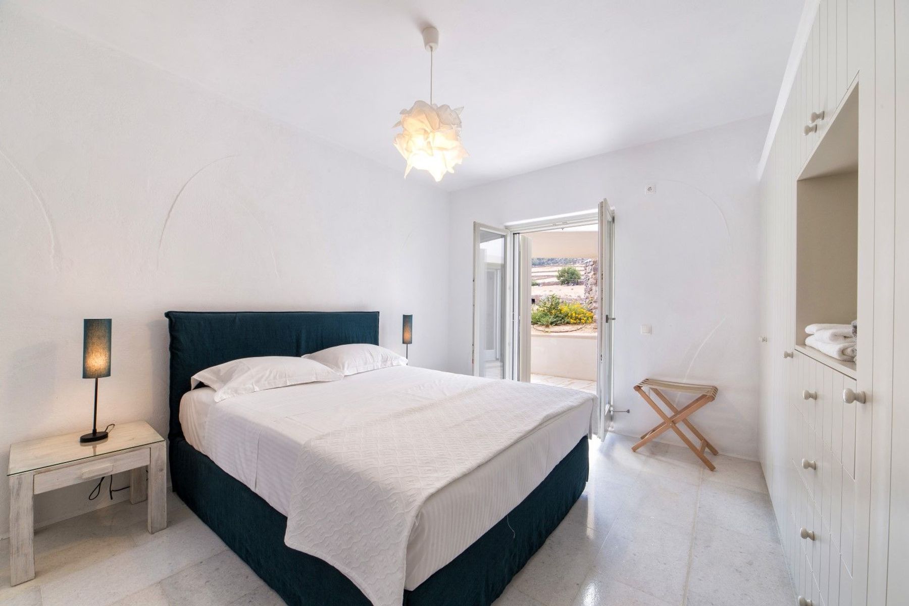 Double bedroom with private outdoor access.