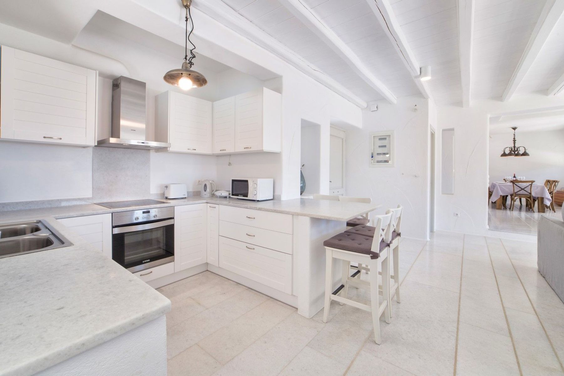 Fully-equipped kitchen with breakfast bar.