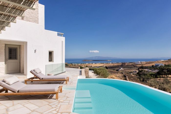 Stylish luxury villa located on the southeast of Paros, overlooking Golden Beach and towards the islands of Naxos, Iraklia and Ios.