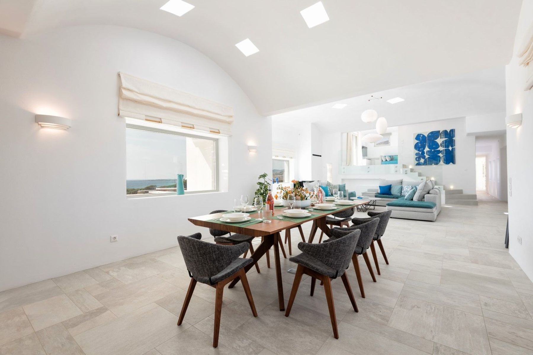 Sit and enjoy meals together in the dining room with a table that seats eight guests.