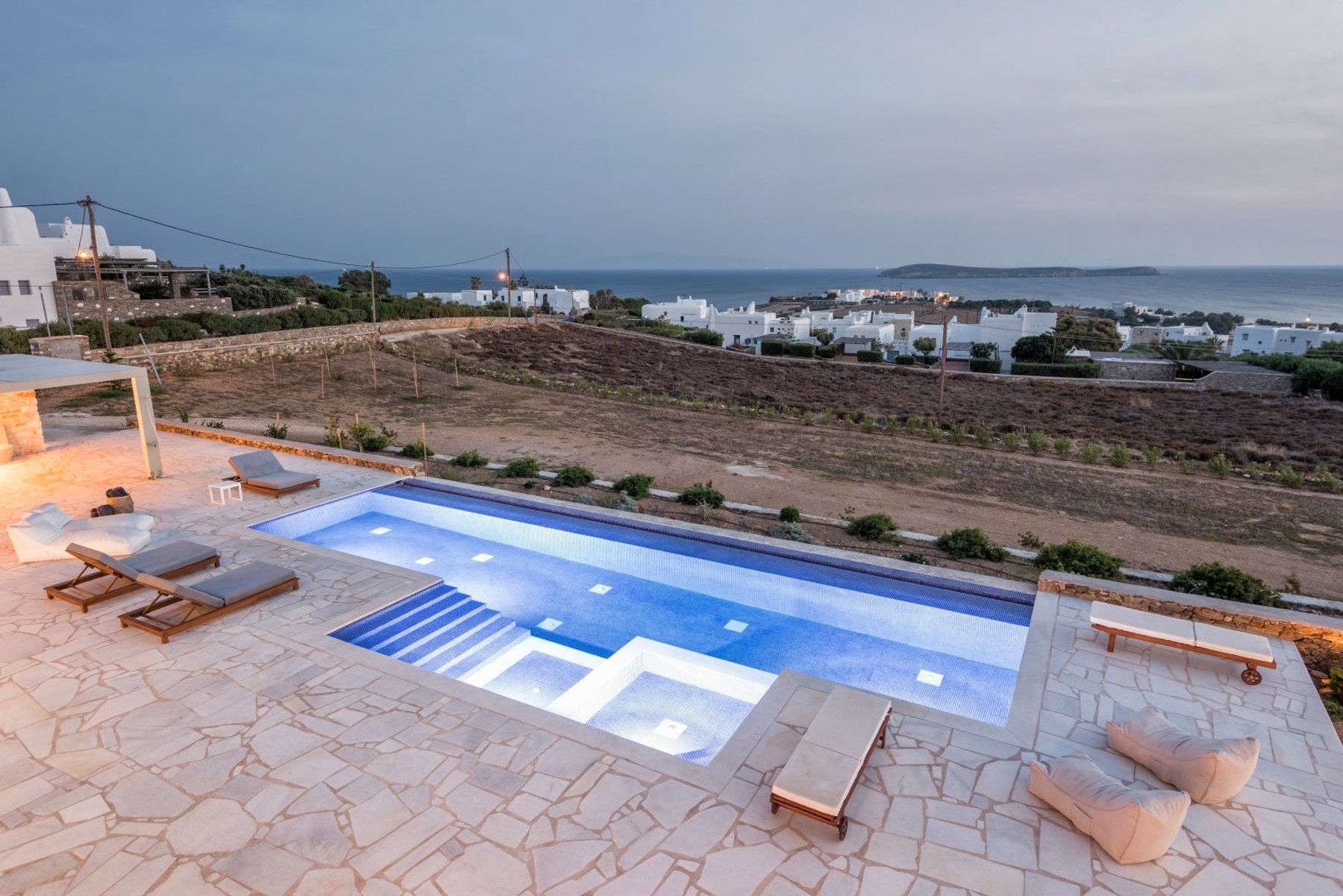 Set on its own private and expansive plot the villa has several open and sun-covered terraces, a fantastic infinity pool and a well-tended garden. 