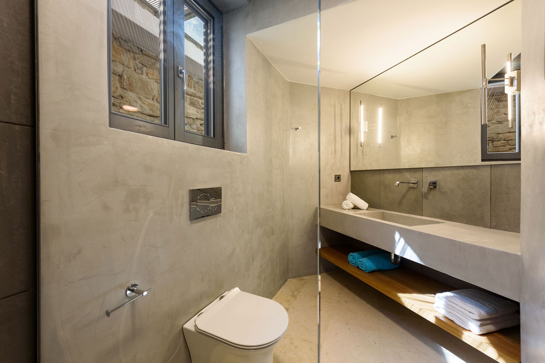 Modern bathroom with walk-in shower.